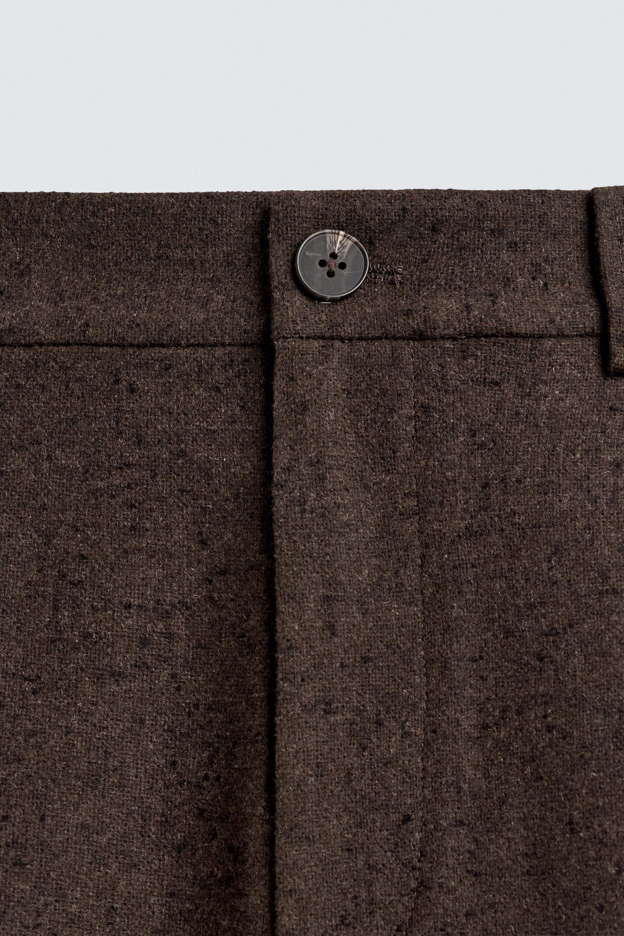 PANTALON BOUTONNÉ À PLIS